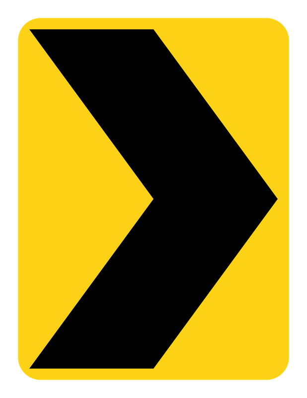 Chevron (Right Curve) Sign road sign — Yellow vertical sign with a black chevron pointing right