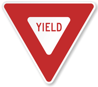 Yield Sign road sign — Downward-pointing triangle with red border and white background